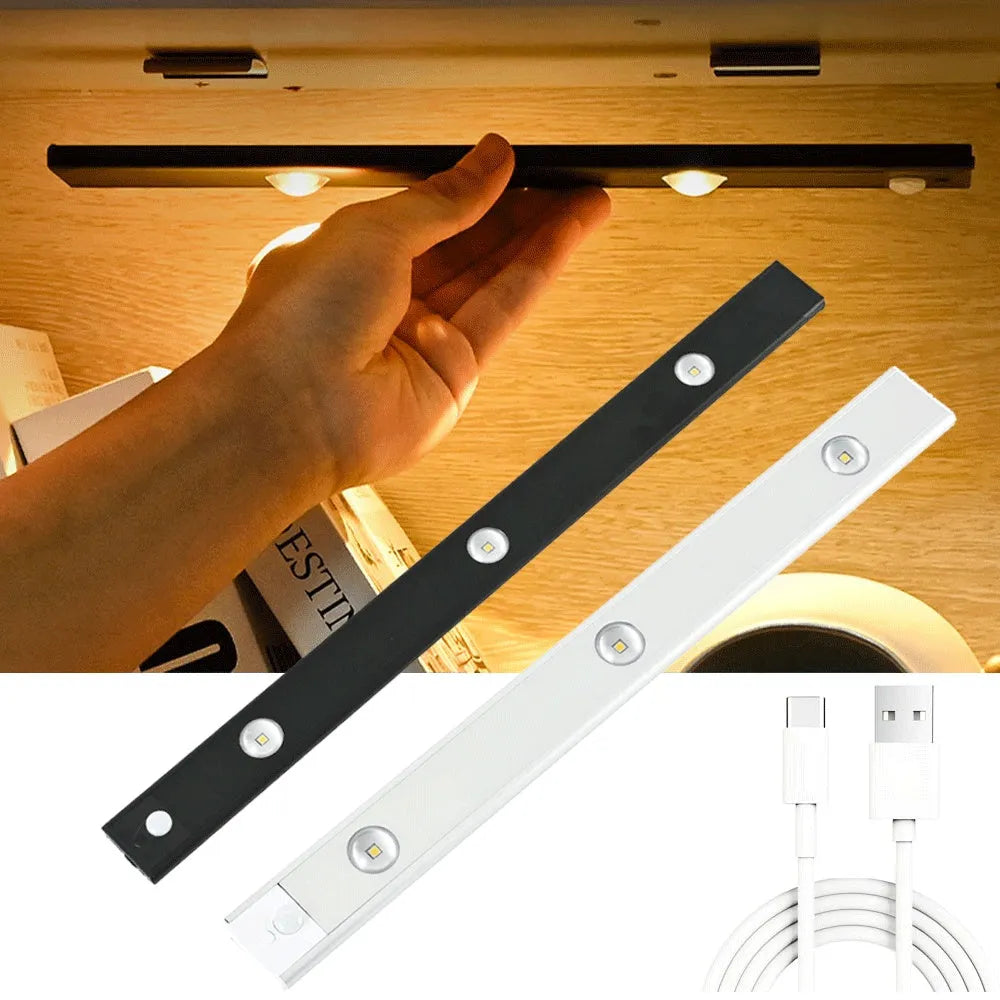 Ultra-thin USB LED night light with motion sensor in silver or black, showing magnet attachment for cabinets