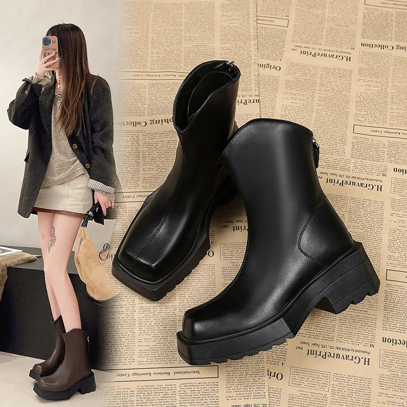 Black platform Martin boots for women with square toe, 6-8cm heel, and back zipper on a mid-calf shaft.