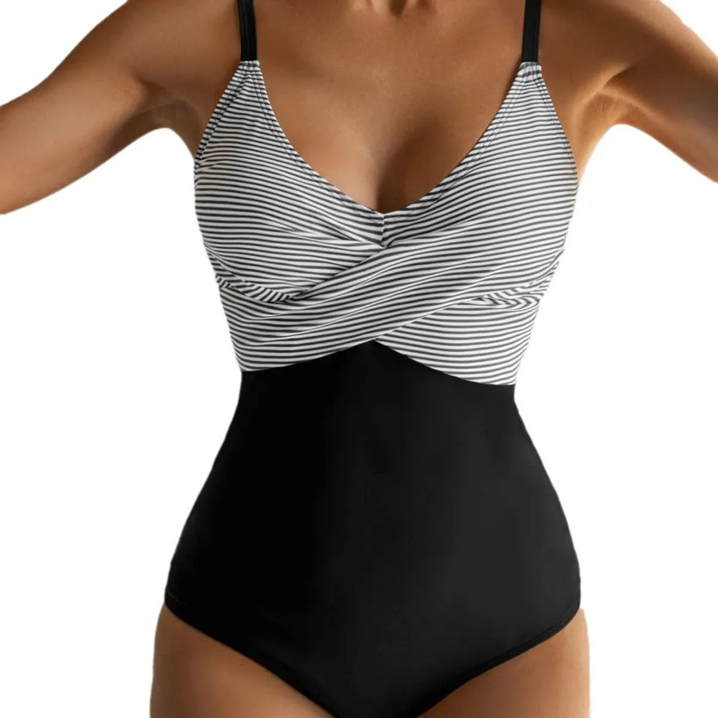 Women's lace-up back one-piece swimsuit in leopard print pattern, showing adjustable back design and sleeveless cut