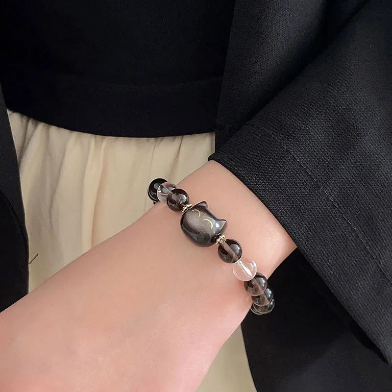 Women's silver stone bracelet with detailed opal cat head charm and 8mm setting