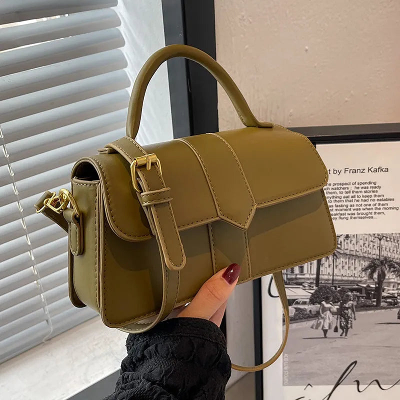 Women's beige messenger bag with 22cm width showing file compartment and exterior pocket