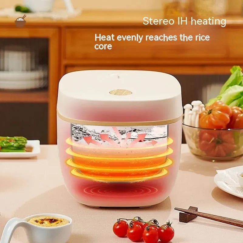 White and beige plastic multi-function 3-litre rice cooker with black inner pot and accessories.