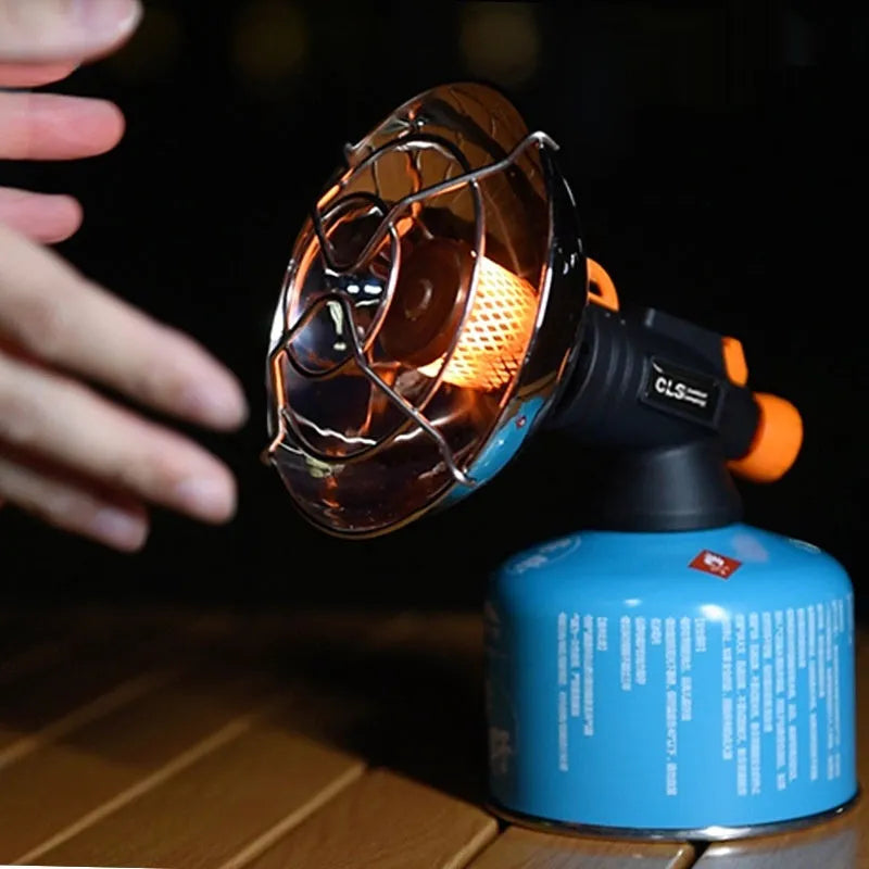 Black and orange portable heating stove with automatic ignition for outdoor camping