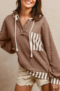 Straw yellow hoodie with waffle texture, striped patchwork design, button neck, and drawstring hood in sizes S M L XL