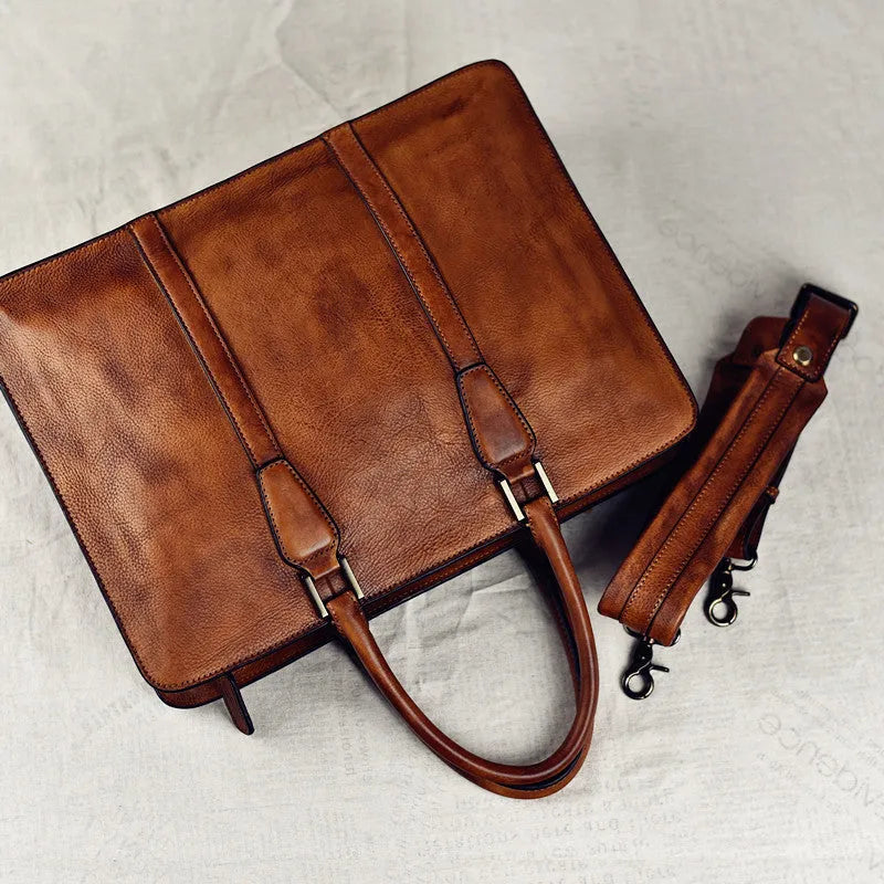 Men's 14-inch horizontal leather handbag with zipper opening in khaki colour, showing vegetable-tanned cowhide texture