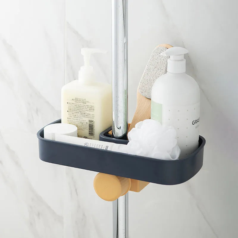 Blue adjustable sink shelf with sponge and brush storage mounted on kitchen faucet