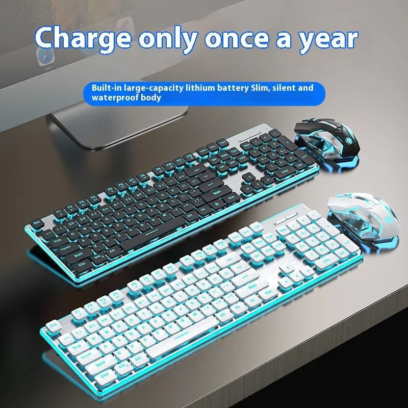 Wireless Bluetooth keyboard with mute button in Cherry Blossom Pink or Warm White, showing compact 440mm design and blue or warm lighting