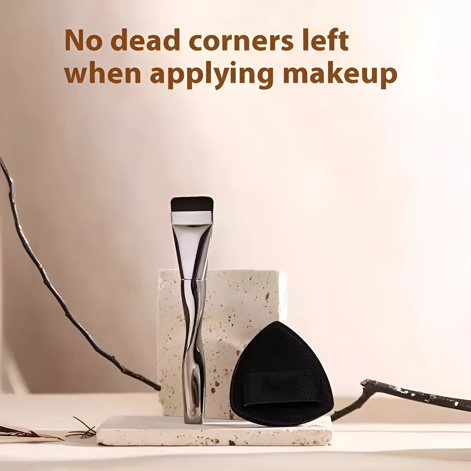 Spiral-shaped black powder foundation brush with long handle and separate makeup puff in packaging
