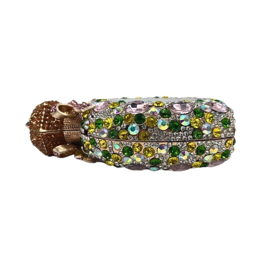 Women's hard alloy clutch bag with full diamond coverage in a golden colour.