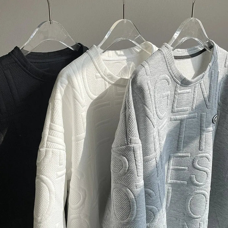 Men's grey T-shirt with raised black letters, loose fit, short sleeves, on a hanger