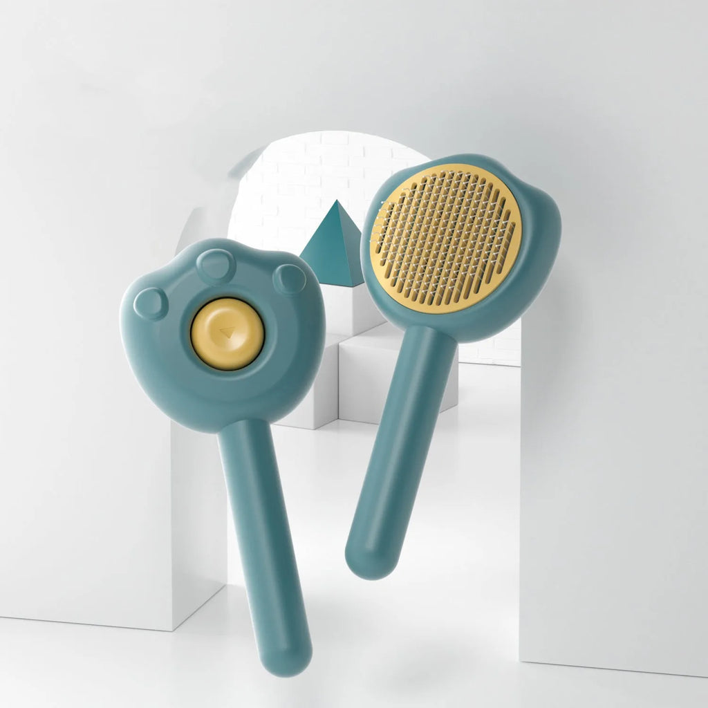 Pet grooming comb with self-cleaning needle teeth and cute handle in blue, green or yellow