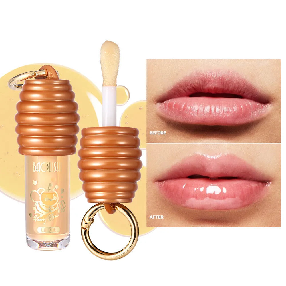 Portable honey lip gloss attached to keychain with moisturising properties