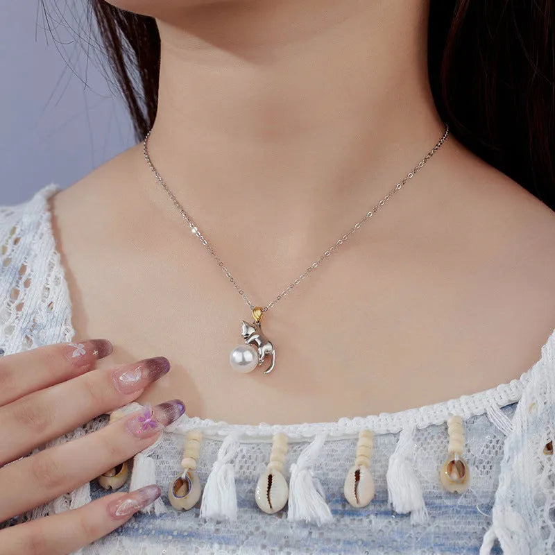 925 sterling silver clavicle chain with cat charm and electroplated finish, showing pearl bead option