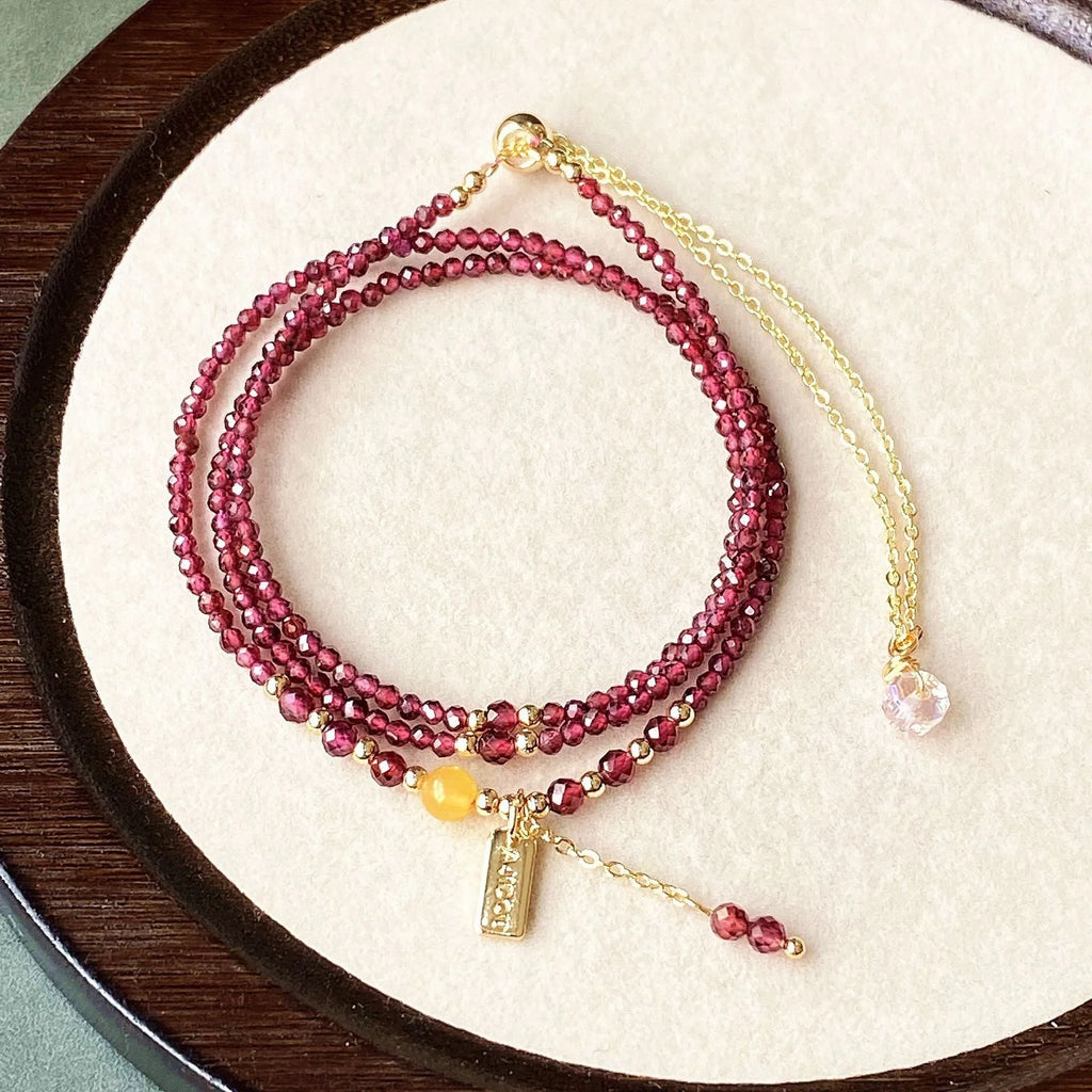 Wine red garnet bracelet with beeswax cut beads that can also be worn as a necklace.