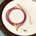 Wine red garnet bracelet with beeswax cut beads that can also be worn as a necklace.
