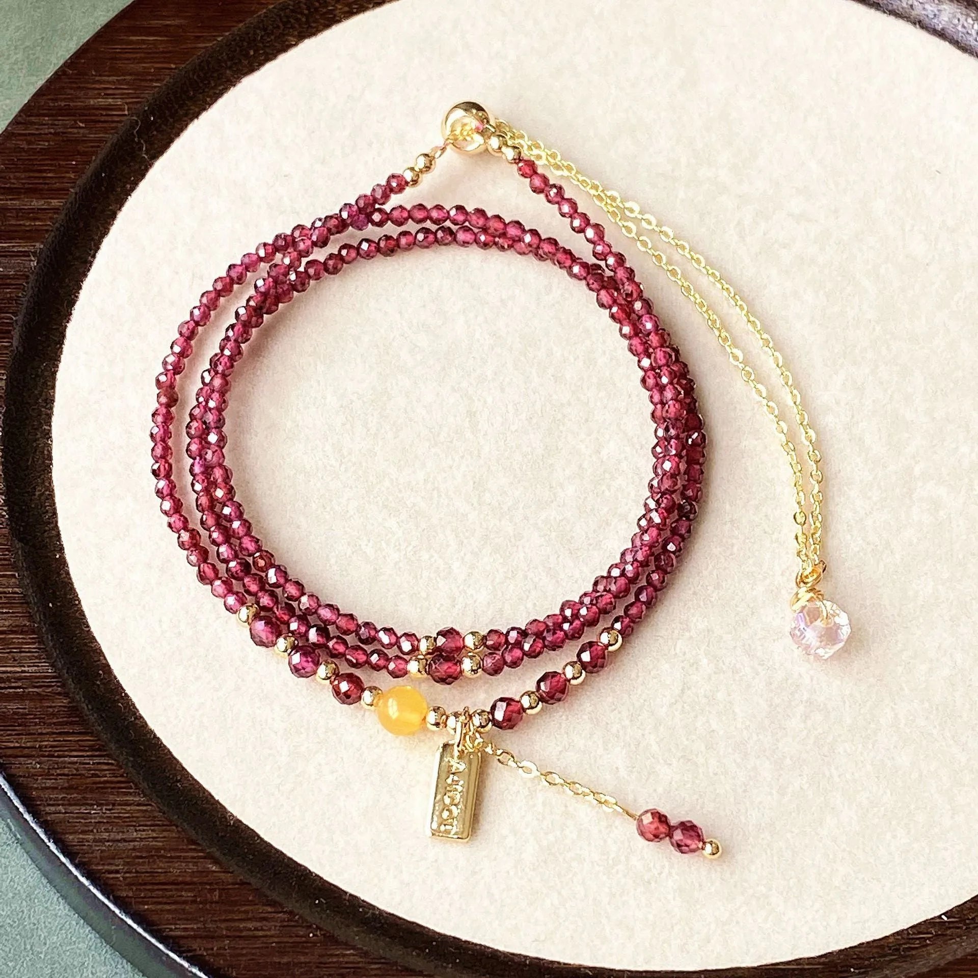 Wine red garnet bracelet with beeswax cut beads that can also be worn as a necklace.