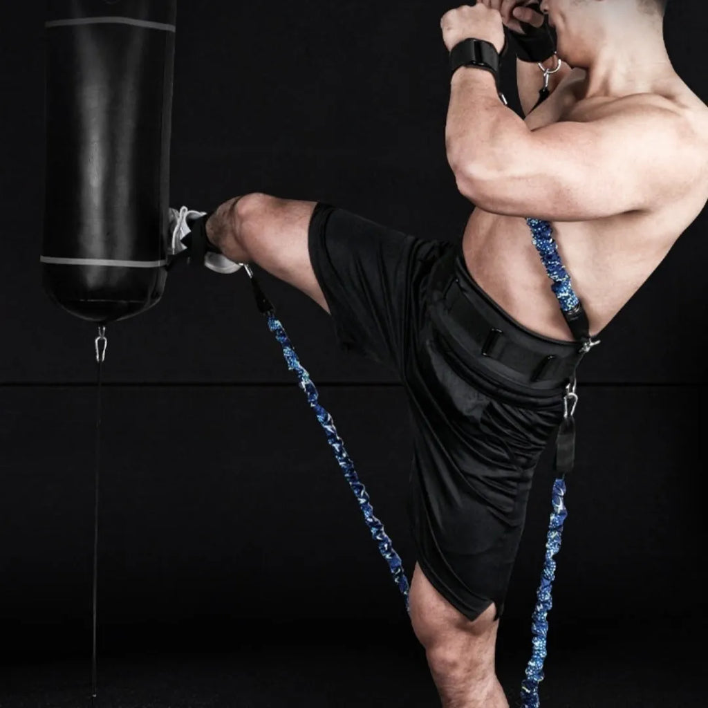 Fitness Bounce chest expander elastic belt with red, blue, black, and green sleeves indicating 100 to 300 pounds resistance