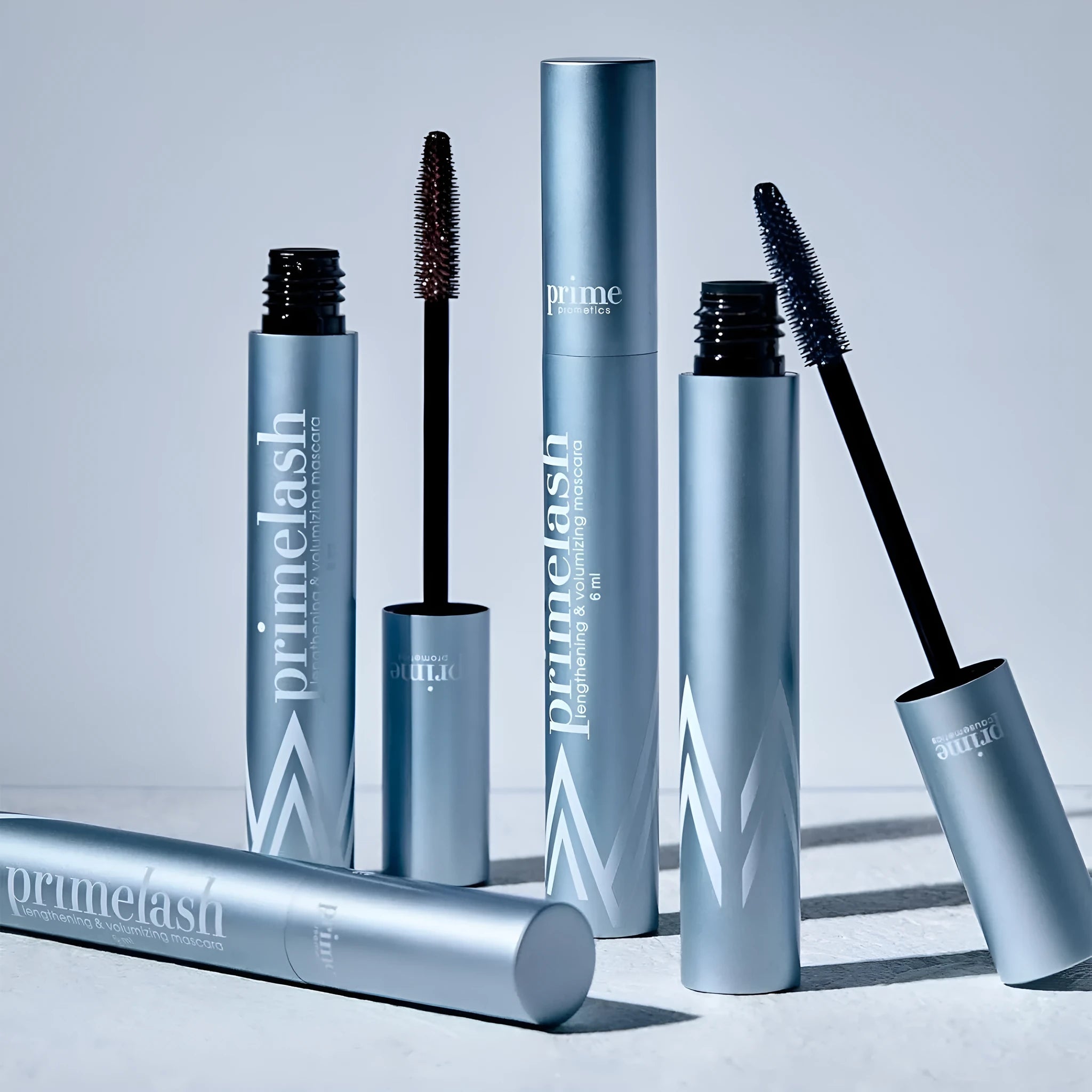 Compact black eyelash and eyebrow grooming stick beauty tool.