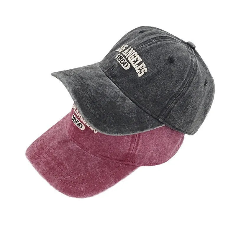 Retro personalised embroidered peaked cap showing adjustable strap and conical crown structure in beige colour