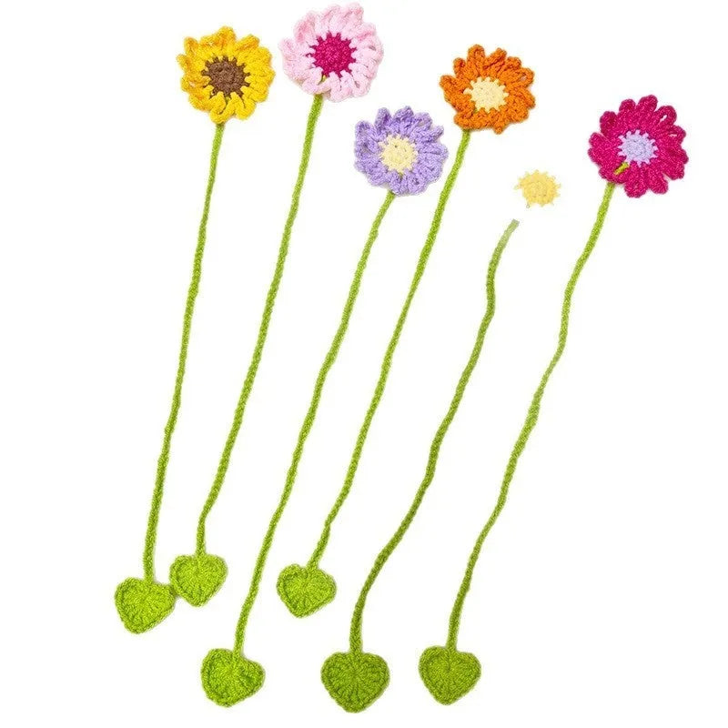 Hand-crocheted wool bookmark with flexible wire core and four milk cotton strands in Little Daisy design