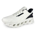 Low-top breathable trainers in dark blue with mesh upper and lace-up front, showing EVA sole and round toe design.