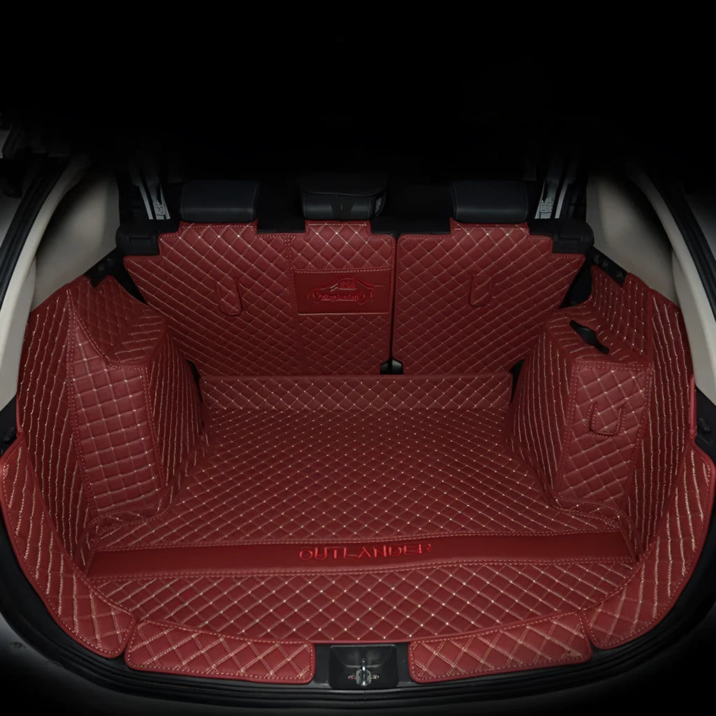 Mitsubishi Outlander custom-fit boot mat with 3D raised edges in a black colour with red trim line.