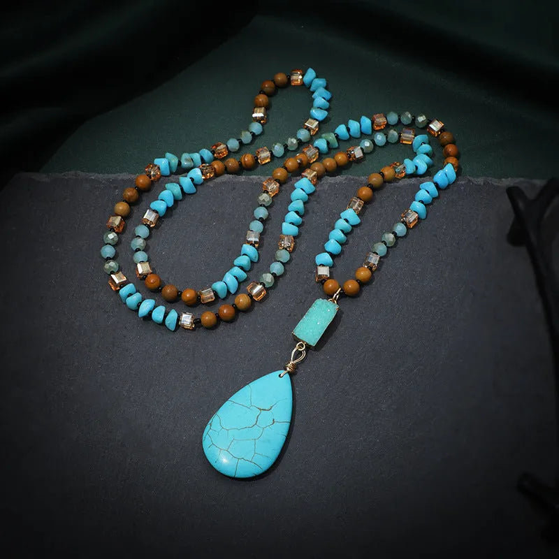 Blue turquoise heart-shaped pendant necklace with water drop silhouette on 81cm ball bead chain