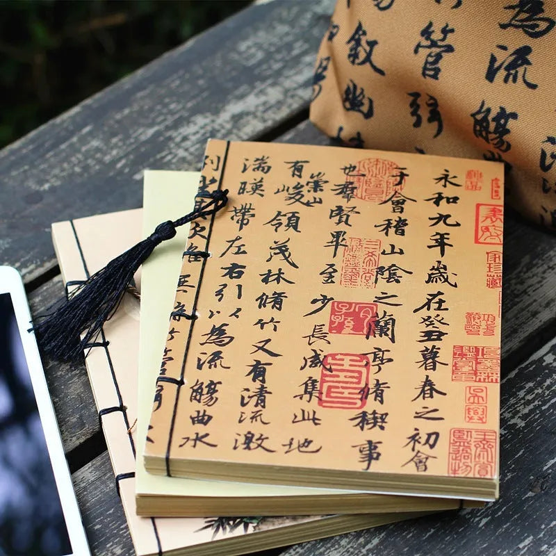 A5 antique-style wire-bound notebook with vintage Chinese painting cover, thread binding, and black wax rope tassel.
