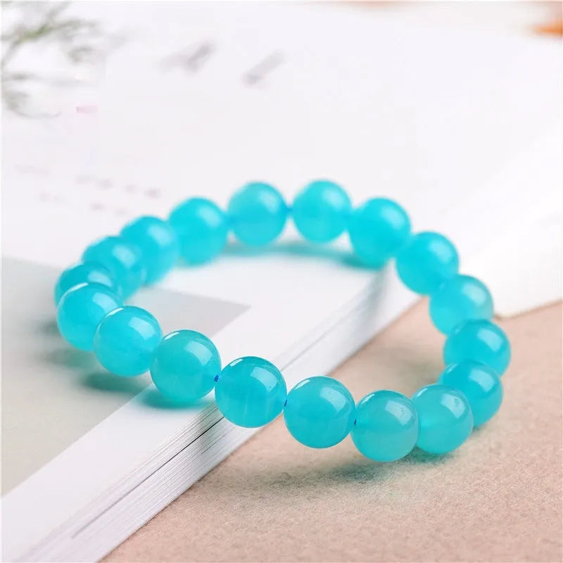 Grade 7A Amazonite scattered beads showing blue-green natural gemstone with polished surfaces for jewellery making