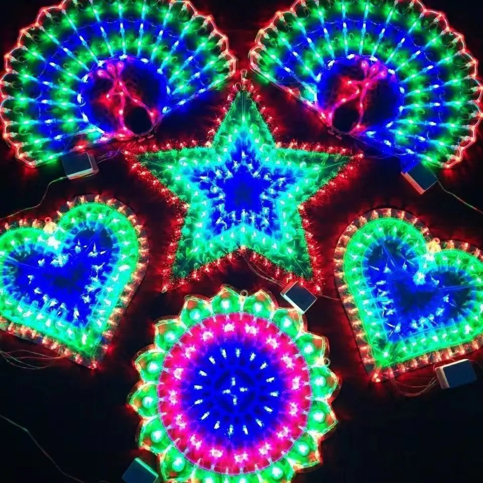 Outdoor Christmas string lights with peacock, love, sunflower, and star designs in plastic housing