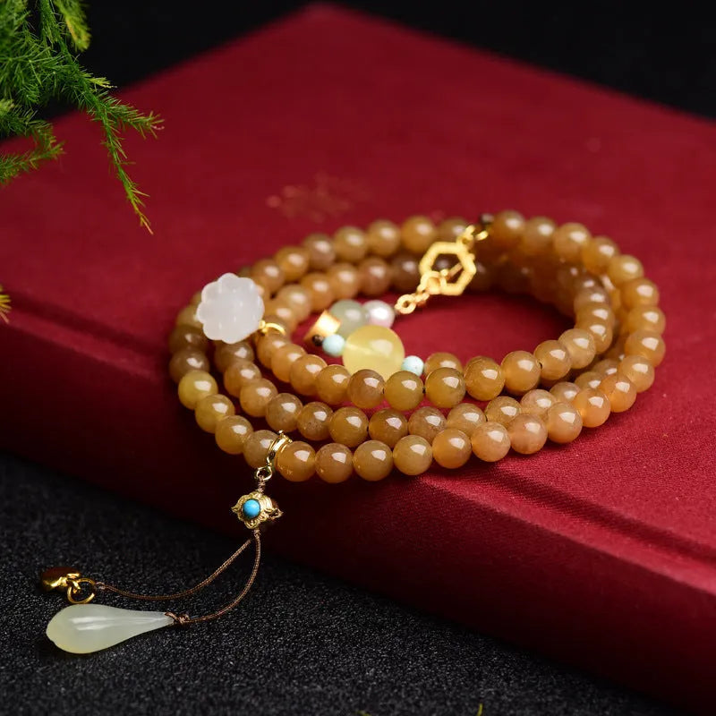 Women's green pine colour jade bracelet with beeswax finish and leaf sequins