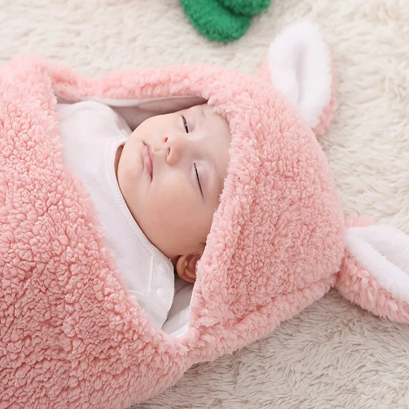 Baby wearing adjustable cotton swaddle sleep sack with velcro closure