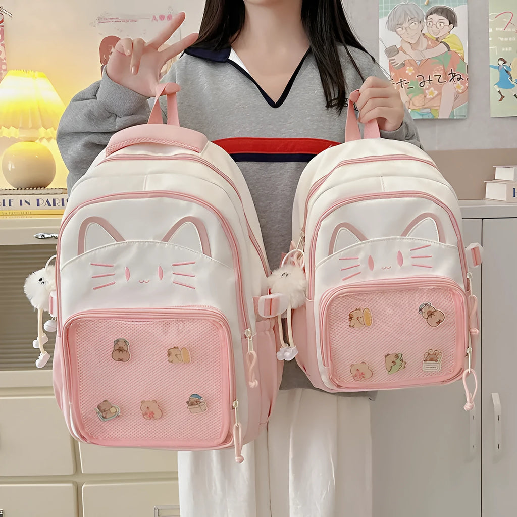 Cartoon design nylon backpack with curved shoulder straps shown in pink colour