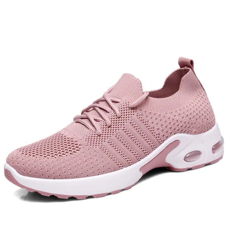 Women's black mesh sneakers with round toe and lace-up front on a white background