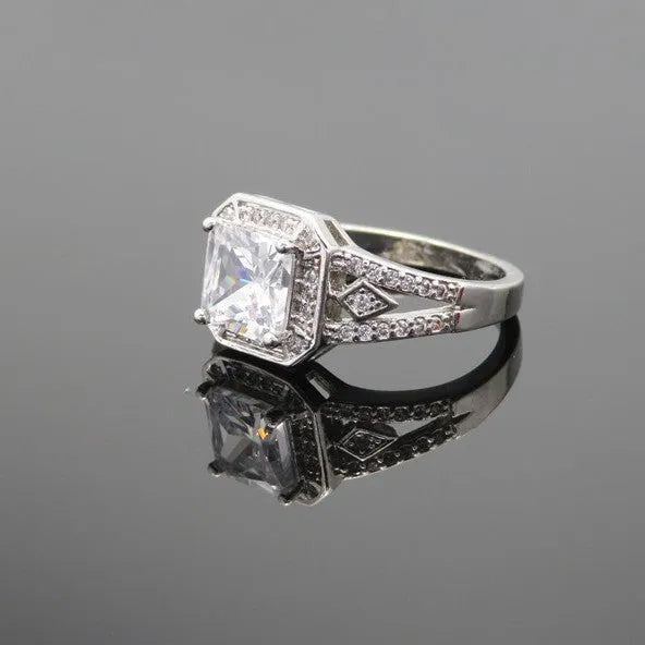 Geometric hollow zircon ring for women in platinum colour with quadrilateral design and inlaid stones