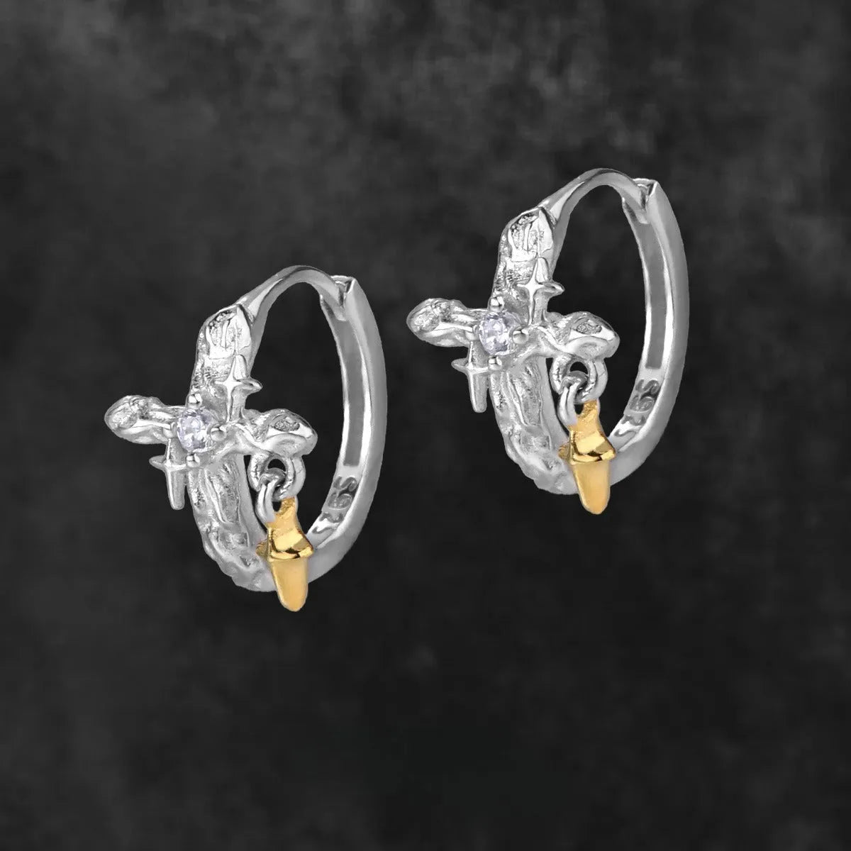 XINGX geometric cross earrings with 1.5cm round element in electroplated white gold colour on 925 silver
