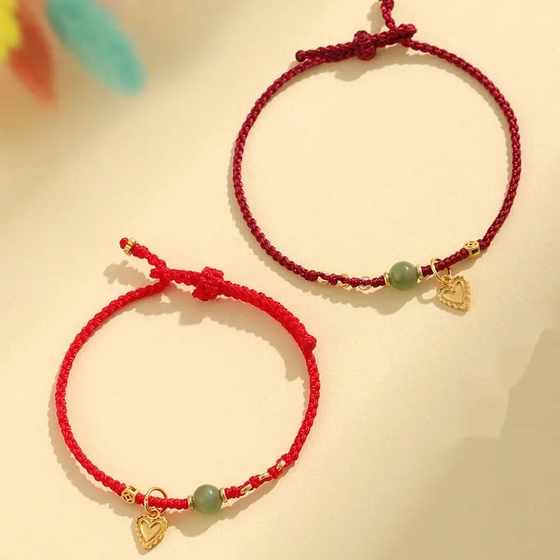 Handmade 925 silver and Hetian jade woven bracelet with red strap