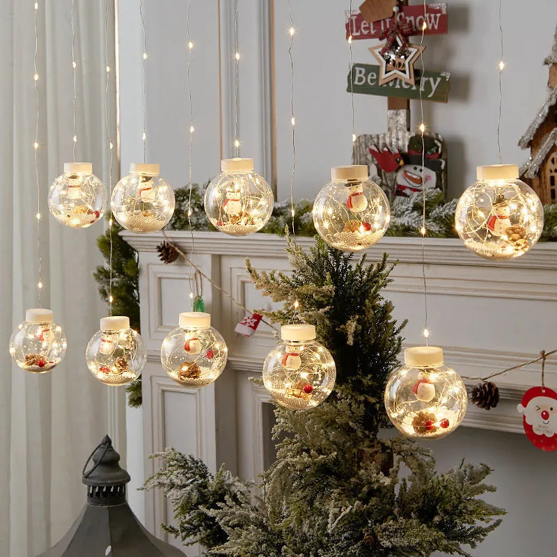 10-piece LED Christmas curtain lamp set with snowman and wishing ball designs