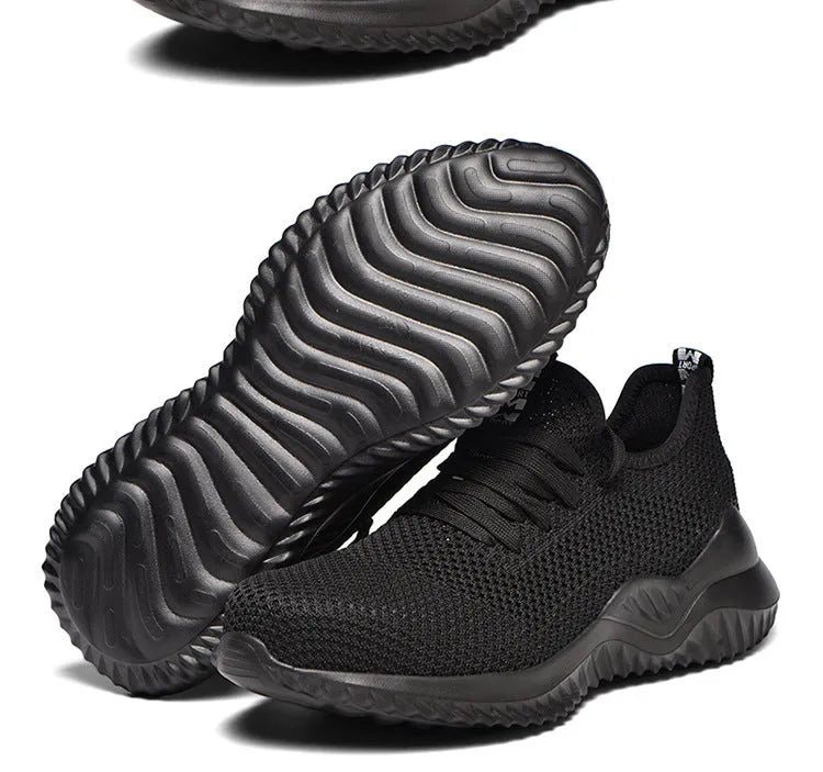 Steel toe cap safety shoes in black with EVA midsole for shock absorption, low-cut design