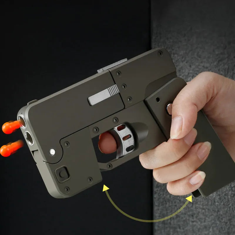 Folding mobile phone toy dart blaster in pink showing double barrels and safe EVA foam bullets