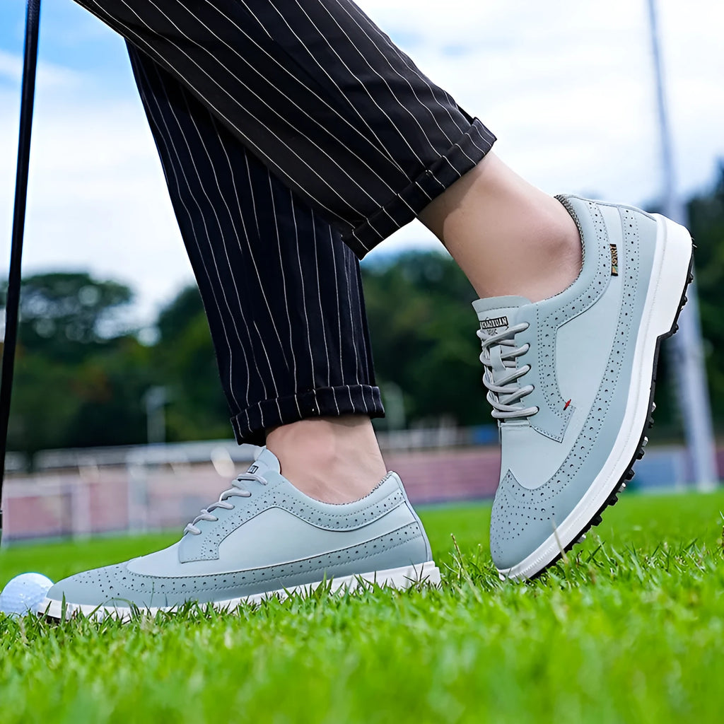Men's genuine leather golf shoes with non-slip rubber outsole in Lake Blue and White colour options.