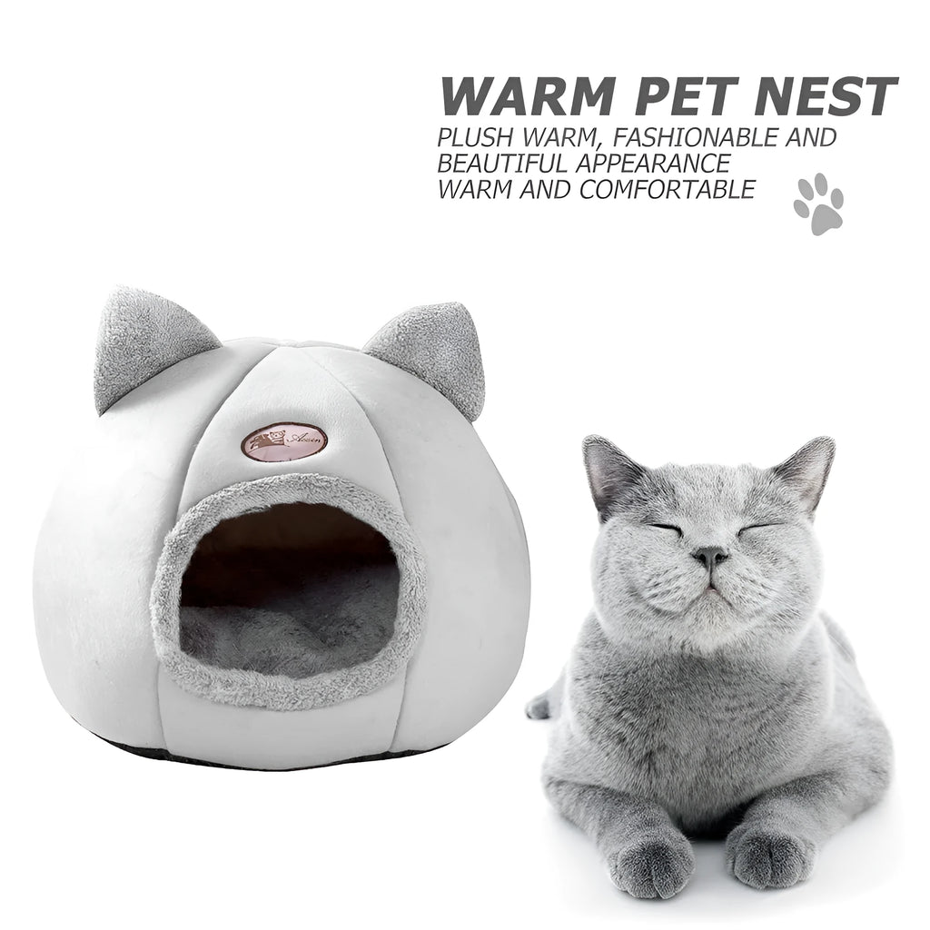 Large fully enclosed fabric cat house with a single entrance, shown in a home setting.