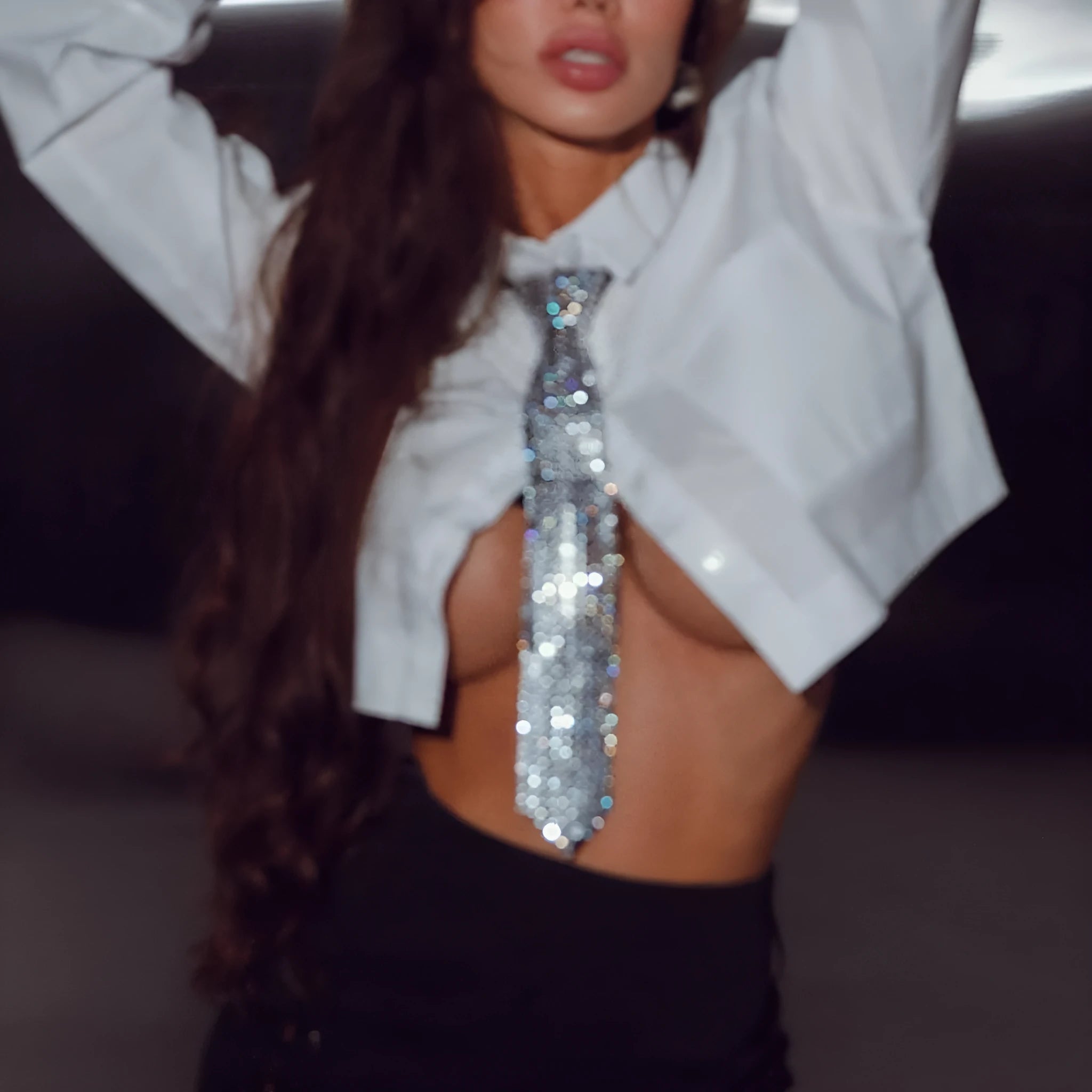 Arrow-shaped metal sequin bow tie in silver colour for adult festival wear.