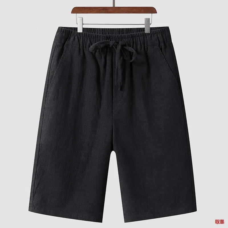 Men's loose linen shorts in beige colour with cropped length and elastic waistband