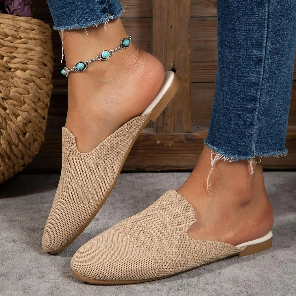 Mesh sandals with cloth upper and rubber sole in apricot colour, showing slip-on design and round toe shape