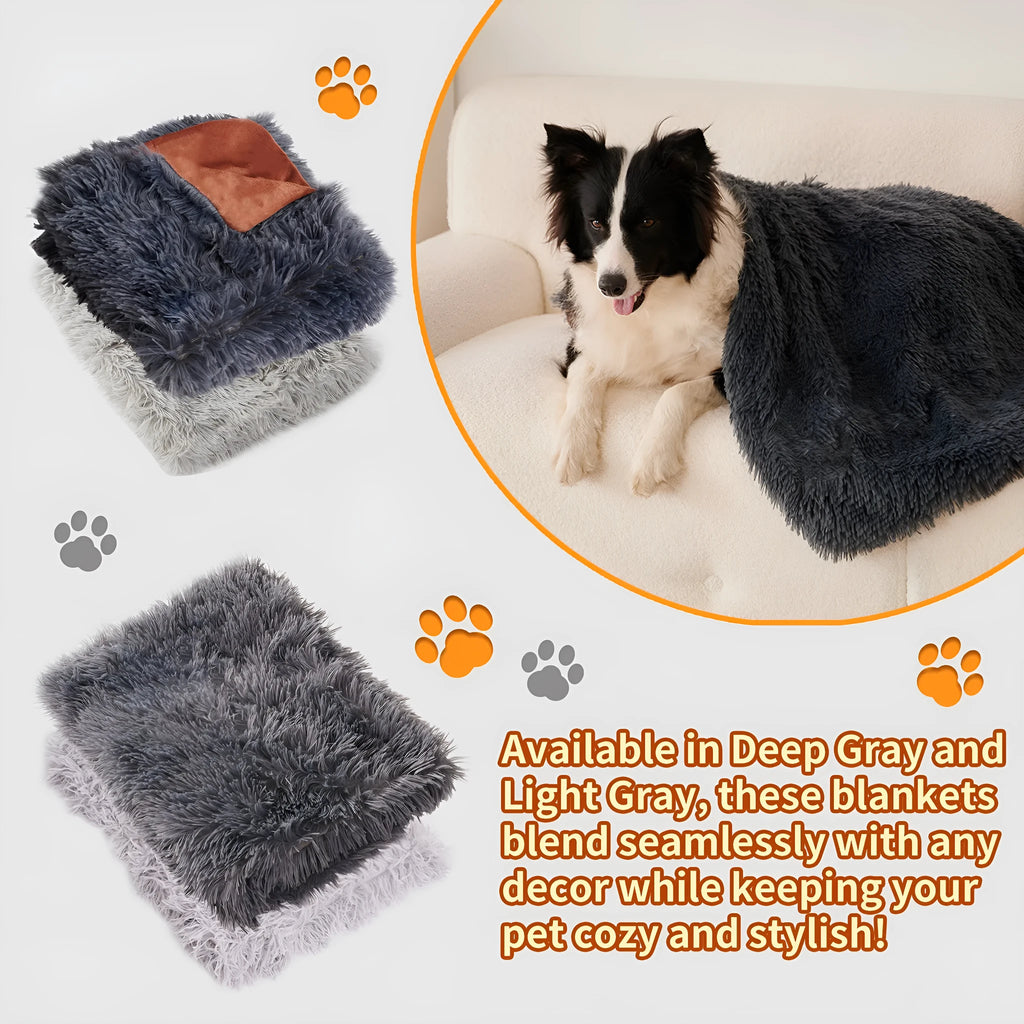 Light grey velvet pet blanket folded on a sofa next to a sleeping dog.