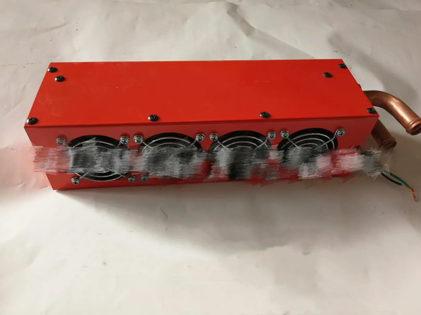 Metal car heater with four small copper pipes for engine waste heat transfer, 34cm long