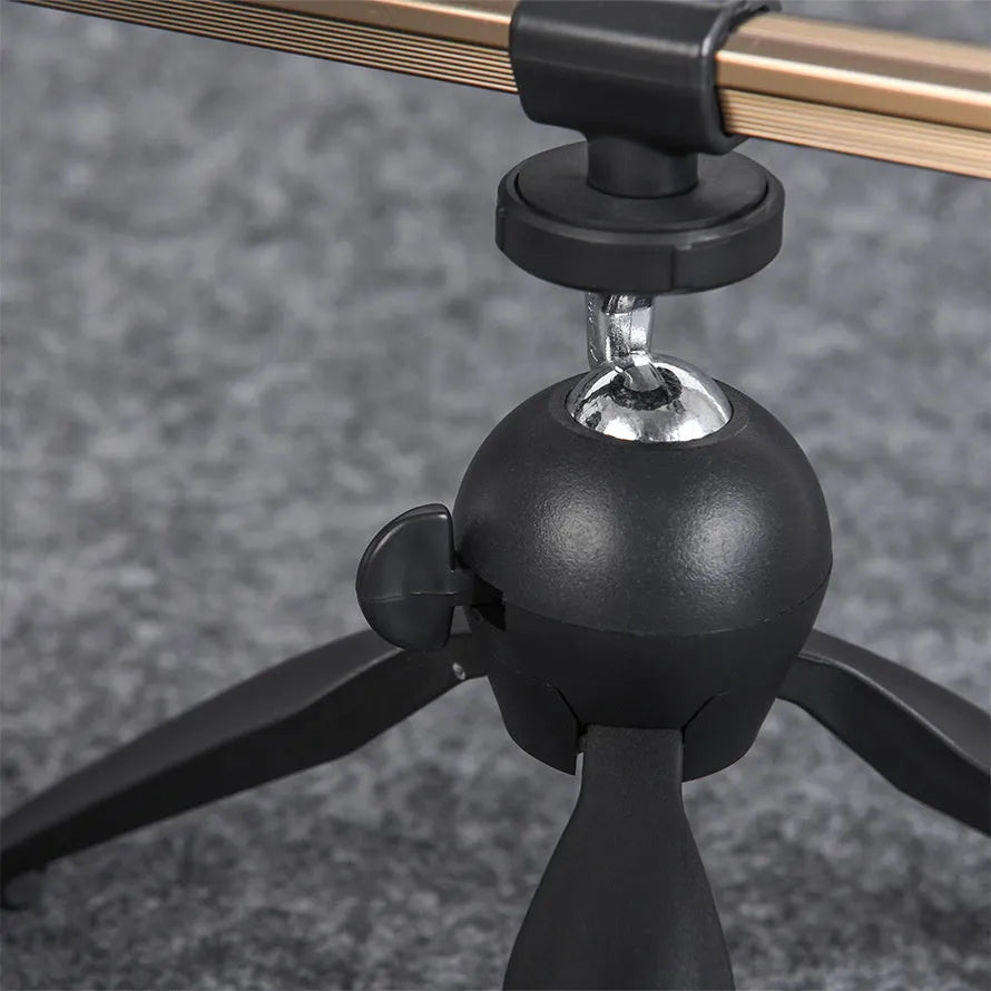 Aluminium ice fishing rod holder bracket with tripod base supporting small fishing rod