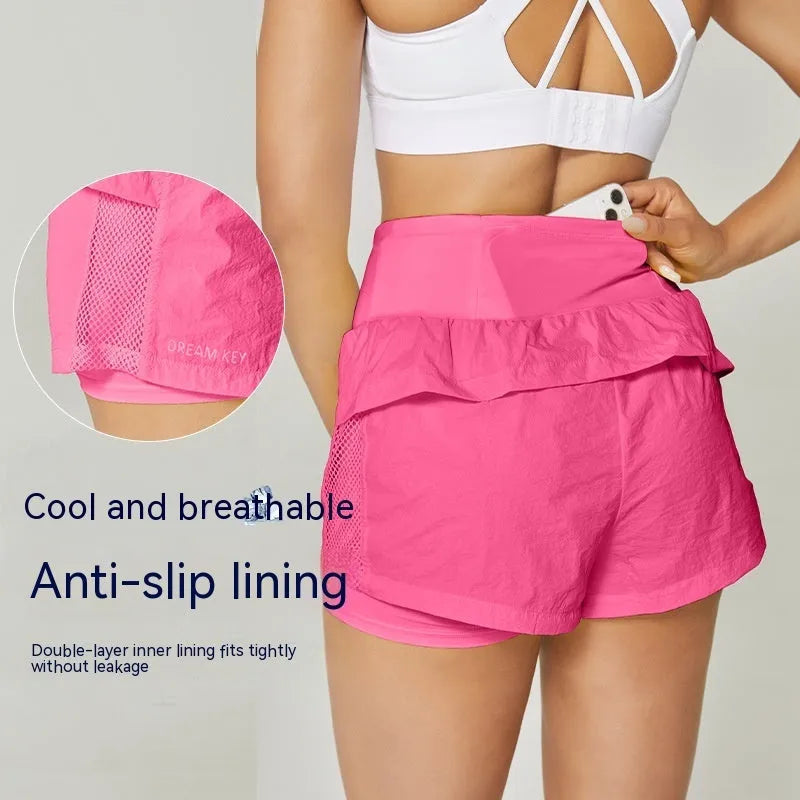 Cotton-blend women's loose fit quick-dry sports shorts in multiple colours on a size chart.