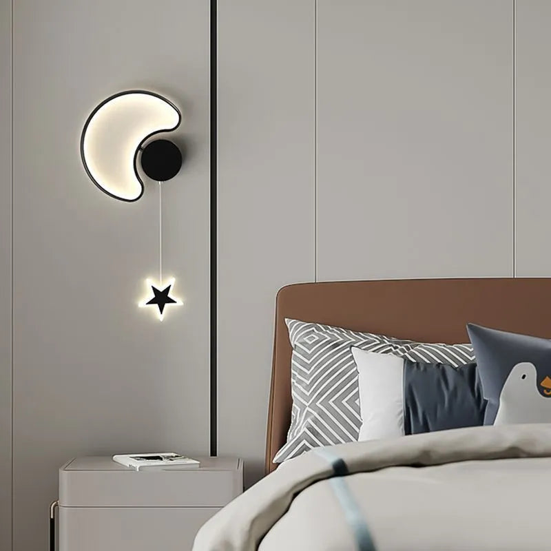 Five-pointed star shaped children's bedside wall lamp with cloud and star motifs in black finish